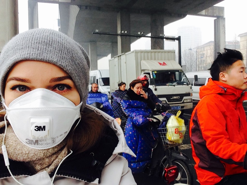 Daria Bokova from Russia living China, cycling through the polluted streets
